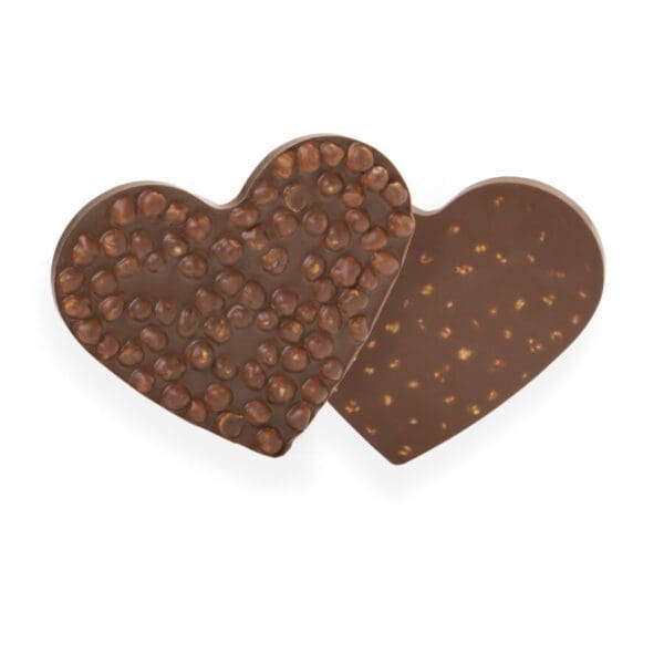 Handmade Milk Chocolate Hazelnut Heart garnished with roasted, caramelized hazelnuts.