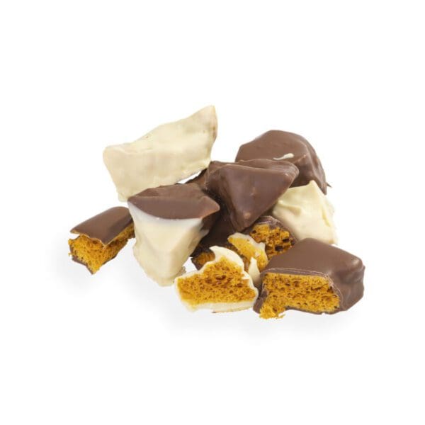 Indulge in a sweet treat that’s truly the bee’s knees with our homemade Chocolate Honeycomb! Made from locally sourced honey and expertly dipped in rich and creamy milk & white chocolate by our Master Chocolatiers, each bite delivers a satisfying snap from the honeycomb, followed by a velvety-smooth chocolate coating that will have you buzzing with delight.