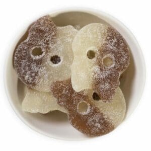 Pick and mix sweets that are flavoured cola and shaped like skulls.