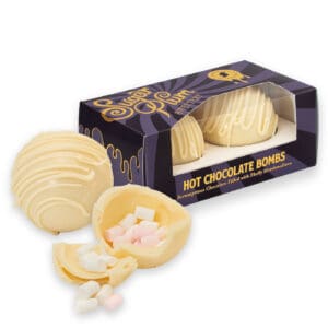 White Hot Chocolate Bombs handcrafted white chocolate spheres filled with hot chocolate and marshmallows from Sugar Plum Sweetery