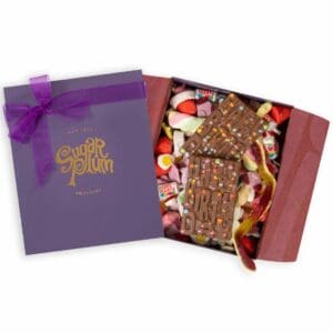 Elegant Birthday Gift Box tied with a bow, featuring an assortment of retro Pick & Mix candies and two milk chocolate bars embossed with 'Happy Birthday' and filled with mini confetti. A delightful and indulgent treat for any celebration.