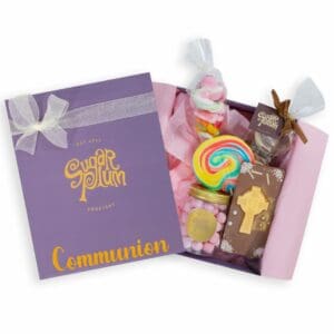 Our First Communion Gift Box is jam-packed with goodies to help celebrate a First Communion. It contains handmade chocolate and pick and mix classics. Delivery available nationwide from our online sweetshop.
