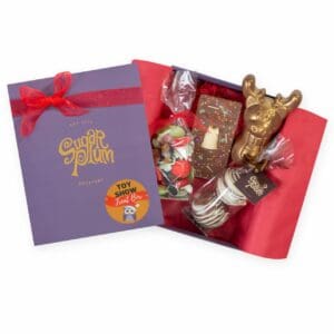 Our medium sized Treat Box is a treasure trove of luxurious chocolates with each bite more tantalising as the last. Like Santa's workshop, each treat is a wondrous surprise, packing excitement and delight. Note: these goods come enclosed in a purple gift box.