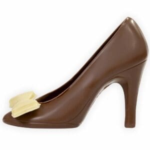 A Milk Chocolate high-heeled shoe, adorned with white chocolate bow on the front. A dainty gift of delicious chocolate.