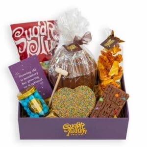 Our Deluxe Birthday Bash Hamper, filled with chocolate delights such as our signature Bash Cake and homemade chocolate honeycomb. Delivery available nationwide.
