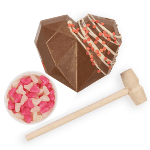 Our mini chocolate bash heart, the perfect gift for Mother's Day. This handmade chocolate masterpiece is full of delicious little jelly hearts. Delivery available nationwide from our online sweetshop.