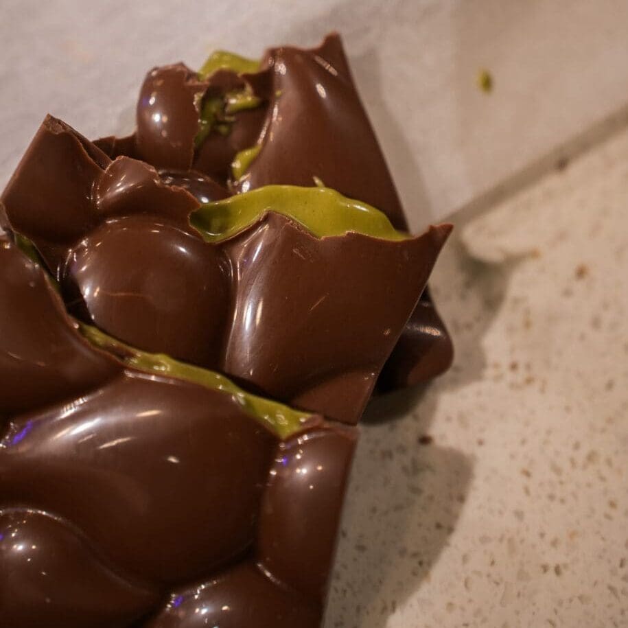 Pistachio Cream Chocolate Bar with creamy pistachio filling and milk chocolate from Sugar Plum Sweetery