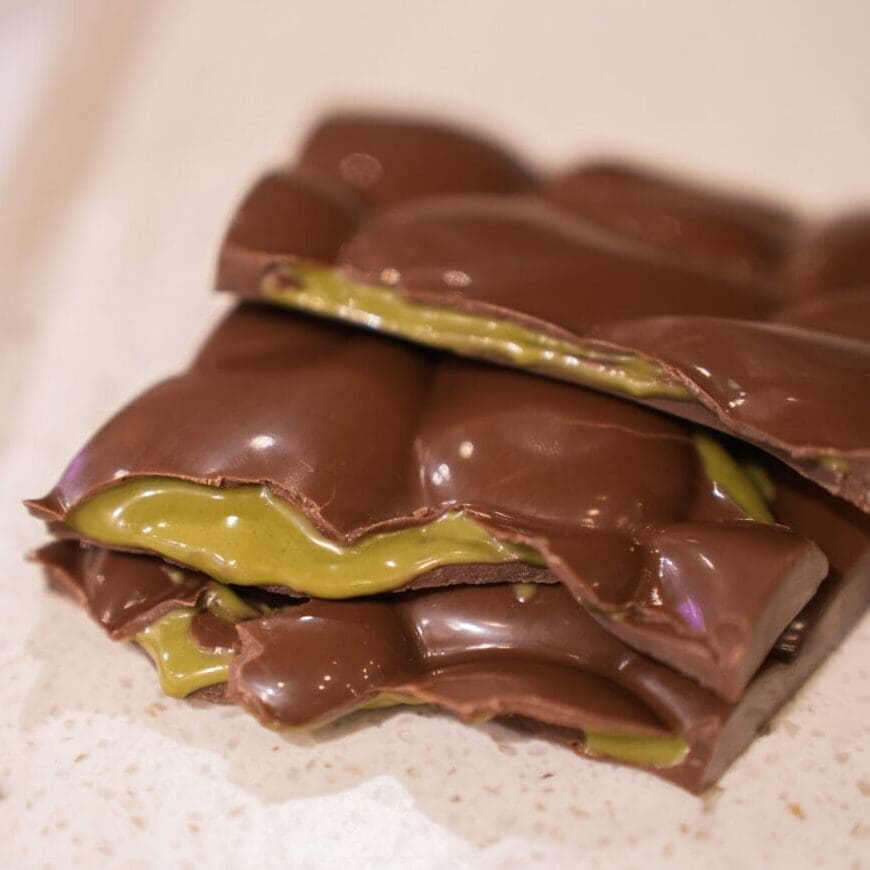 Pistachio Cream Chocolate Bar with creamy pistachio filling and milk chocolate from Sugar Plum Sweetery