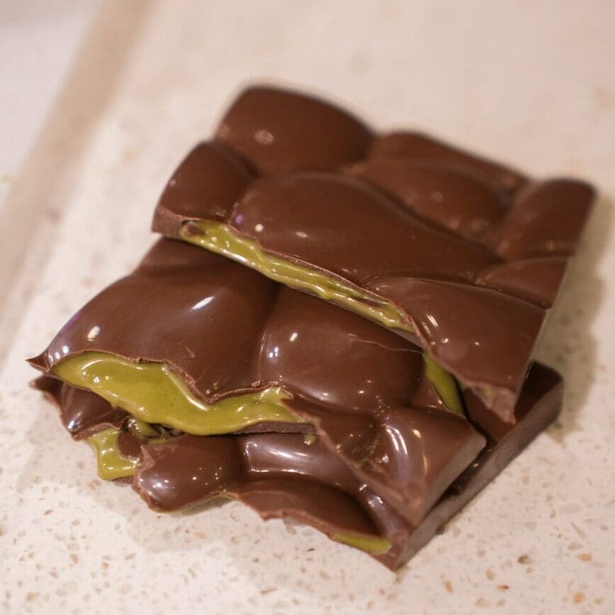 Pistachio Cream Chocolate Bar with creamy pistachio filling and milk chocolate from Sugar Plum Sweetery