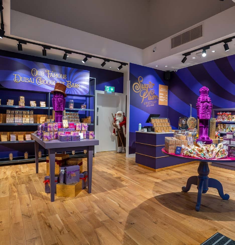 Dubai chocolate bars and purple swirl walls in the Kildare Village shop
